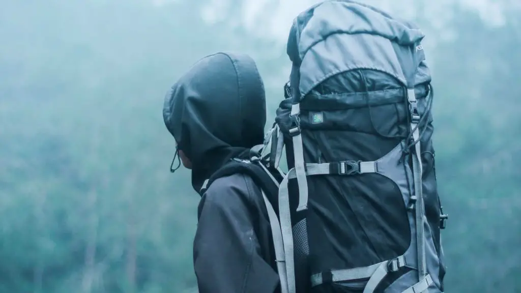 Hiking in the rain carrying a large pack - How Thru Hiking Changes You