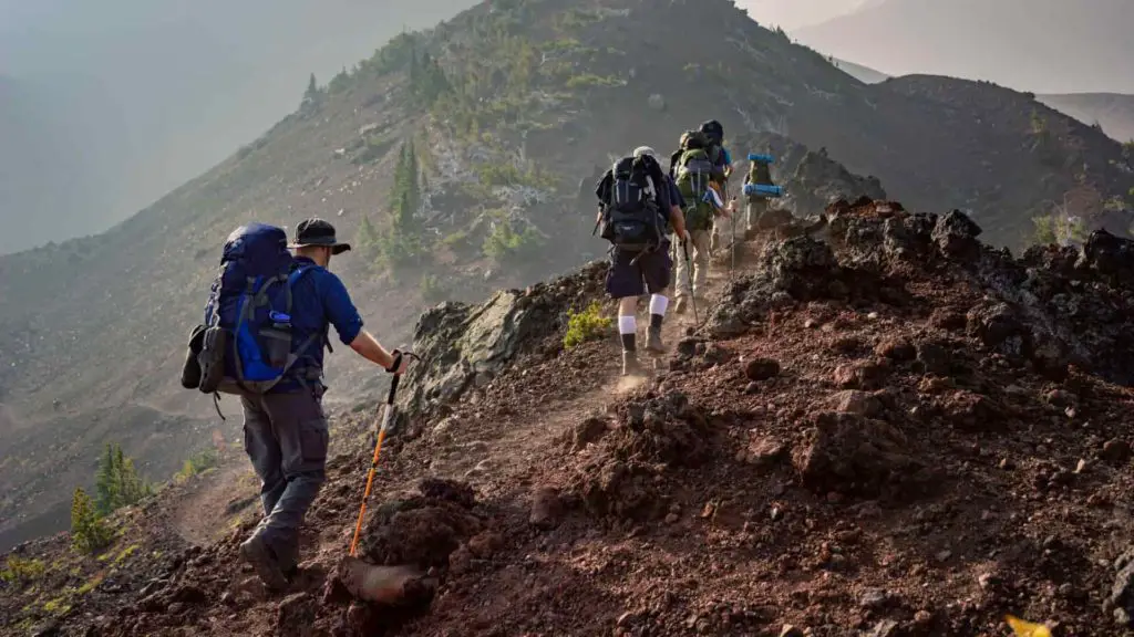 climbing a trail - How Thru Hiking Changes You